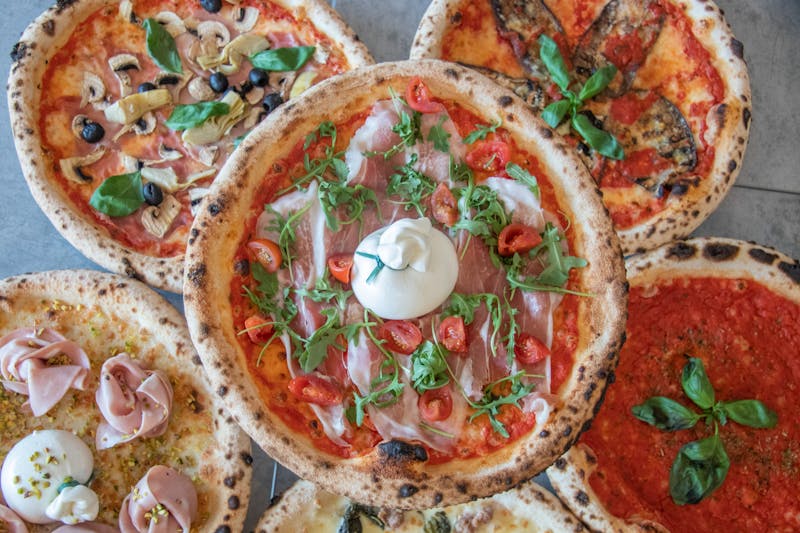 Green lantern pizza signature pie crafted with fresh ingredients