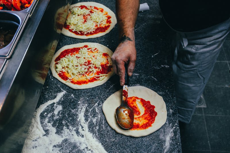 Green Lantern Pizza kitchen with fresh ingredients being prepared